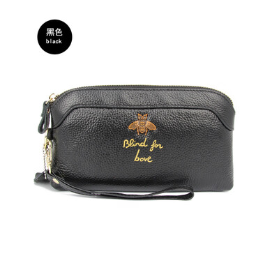 

The first layer of cowhide 2019 new ladies leather Europe&America bee bills position shell type clutch bag long wallet
