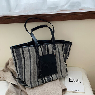 

2019 autumn fashion plaid canvas womens bag hit color handheld oblique span single shoulder bag leisure shopping bag