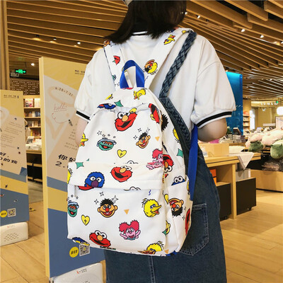 

Schoolbag female Korean Harajuku ulzzang junior high school high school students cartoon printed ins backpack ancient feeling back