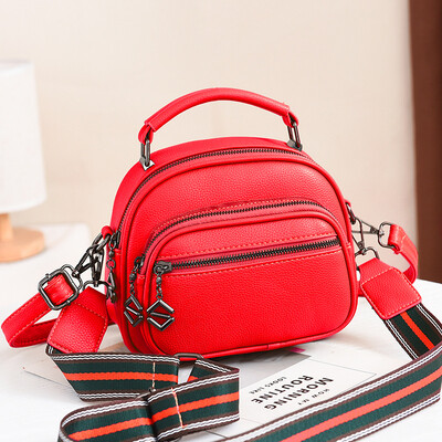 

Summer on the new small bag lady new fashion small round bag leisure inclined bag single shoulder handheld Korean version Baitao T