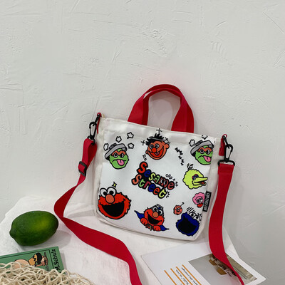 

Cute cartoon wild shoulder messenger bag female 2019 new casual fashion ugly cute Sesame Street portable canvas bag