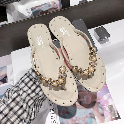 

Ins port style slippers summer Korean version 100 water drill flat foot flip character drag chic fairy