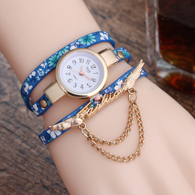 

New broken pattern ladies winding fine strap watch female models fashion wings pendant quartz watch