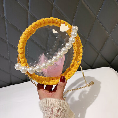 

2019 new woven round pearl handbag female chic wild chain cosmetic bag personalized transparent Messenger bag