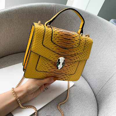 

Qiao Bani 2019 new European&American style fashion snake pattern transition color BV snake head flip cover shoulder shoulder diagonal handbag