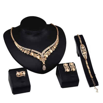 

Africa Style Gold Plated Round Hollow Pendants Necklace Earrings Bracelet Ring Jewelry Set