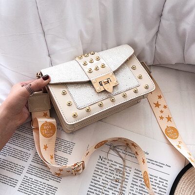 

Senior sense small bag female 2019 new Korean version of the wild sequins rivet Messenger bag wide shoulder strap shoulder small square bag