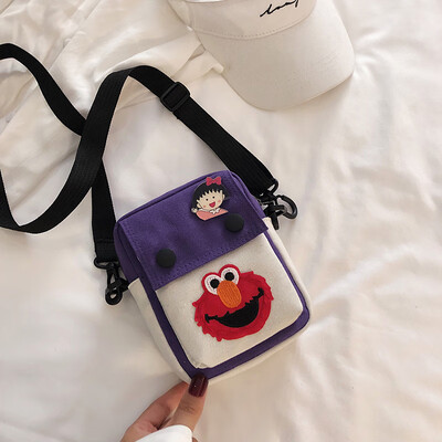 

Simple&versatile fashion contrast color shoulder Messenger bag female 2019 new casual cute cartoon sesame street canvas bag