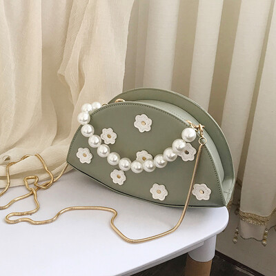 

Summer texture bag female 2019 new Korean version of the wild single shoulder slung fashion pearls portable chain dumplings package