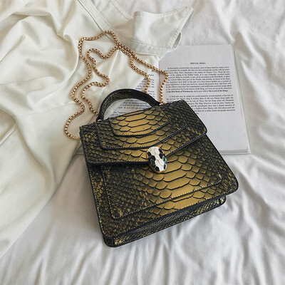 

Qiao Bani 2019 new European&American style fashion snake skin pattern BV snake head flip cover bag shoulder diagonal cross tide handbag
