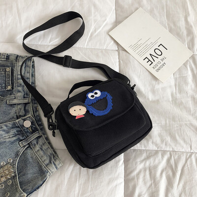 

2019 new casual fashion ugly sesame street canvas bag female cute cartoon simple versatile shoulder Messenger bag