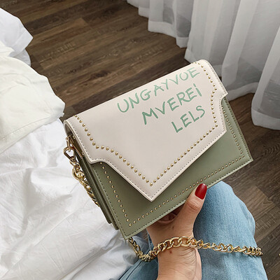 

Qiao Bani 2019 new Korea Dongdaemun fashion rivet flip bag shoulder diagonal tide handbag