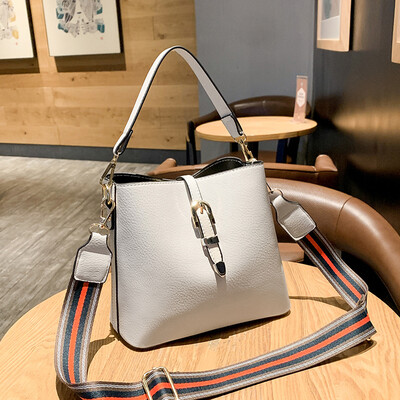 

Shangxin Xiaoxia Chao Baitao single-shoulder lock Bucket Bag Fashion inclined Lady Bag Handbag