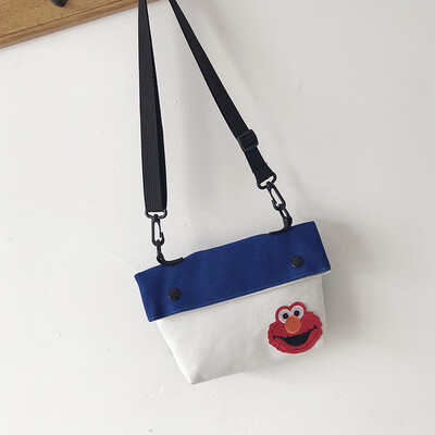 

2019 new simple&versatile fashion contrast color shoulder Messenger bag female casual cute cartoon sesame street canvas bag