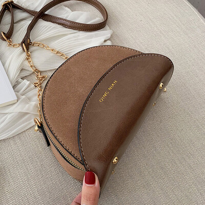 

One shoulder slanted small bag double zipper 2019 Korean version of the new fashion semicircular bag hit color chain small bag tid