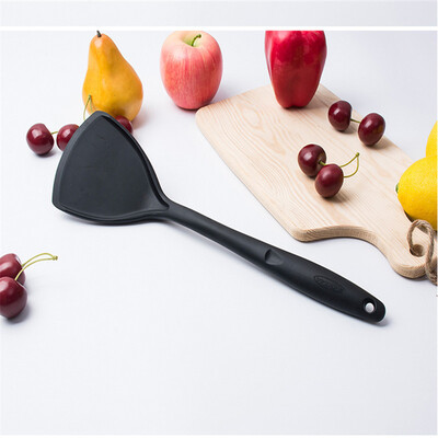 

Silicone spatula with metal insert either in black or red color
