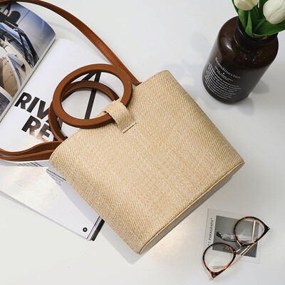 

2017 summer new Korean version of the straw wrapped wood ring handbag simple shoulder bag large capacity package