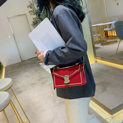 

Qiao Bani 2019 new Korean chic fashion embroidery thread chain flip hard handle handbag shoulder diagonal handbag
