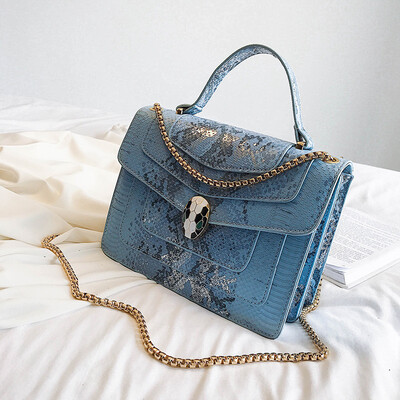 

Qiao Bani 2019 new European&American style fashion BV snake snake head flip bag bills shoulder diagonal cross trend handbags
