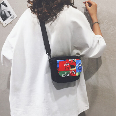 

Canvas small bag female 2019 new ins Japanese Harajuku student shoulder Messenger bag cartoon Sesame Street bag tide