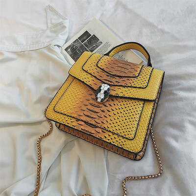 

Qiao Bani 2019 new European&American style fashion snake pattern transition color BV snake head flip cover shoulder shoulder diagonal handbag