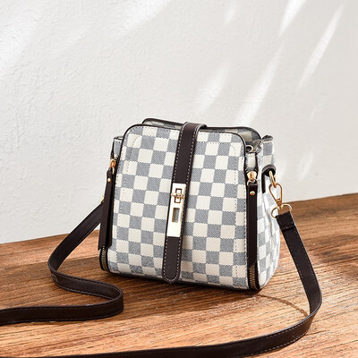 

Summer ladies go on the fashion trend with simple bucket bag on one shoulder in summer