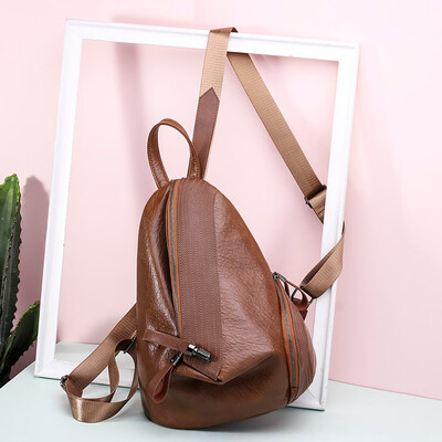 

Tailored Woman Backpack Personality Tweezers Soft Leather Lock Small Backpack