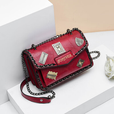 

Retro spring&summer tide woman hand-held retro badge 100 lap rivets chain single shoulder oblique satchel bag