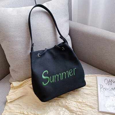 

Summer new casual bag female 2019 new Korean fashion letters canvas bag wild single shoulder slung bucket bag
