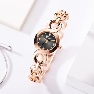 

RM Fashion Casual Four-Scale Diamond Dial Buckle Strap Ladies Quartz Watch
