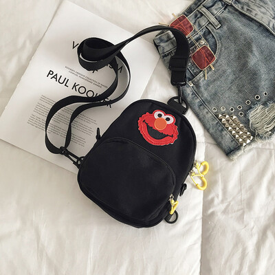 

Cute cartoon simple wild shoulder Messenger bag female 2019 new casual fashion ugly cute Sesame Street canvas bag