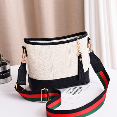 

New fashionable broadband bag for vagrant ladies with one shoulder&inclined bag Korean version of Xiaoxiang lady bag&100 b