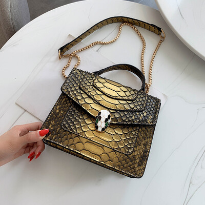 

Qiao Bani 2019 new European&American style fashion street beat snake pattern BV snake head flip cover bag shoulder shoulder diagonal female bag