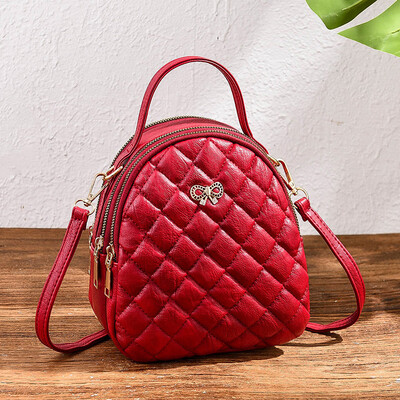 

Bag female 2019 new multi-function shoulder small backpack wild hand strap shoulder slung three-use female bag personality tide