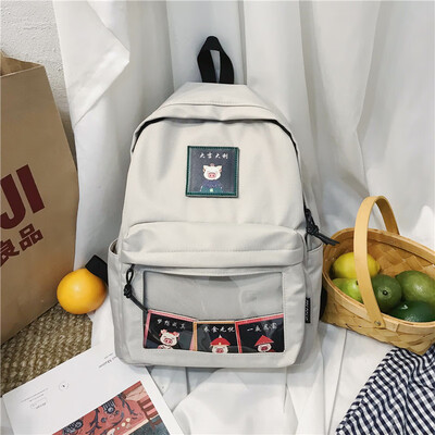 

Junior high school schoolbag female Korean high school students backpack ins wind campus Joker cartoon Harajuku ulzzang