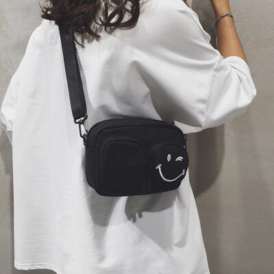 

Ins super fire on the new canvas casual slung packet female 2019 new Korean version of the wild net red shoulder small square bag