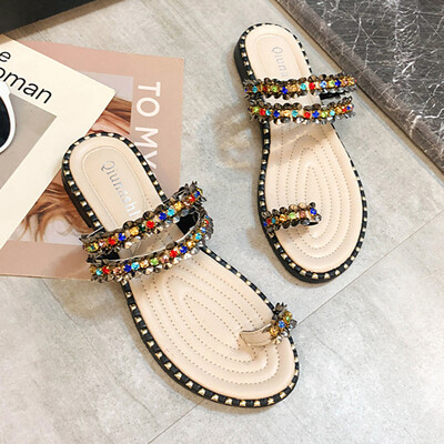 

Slippers for women wearing summer Korean version of Baitao fashion water drill sandwich clip toe flat-bottom beach shoes