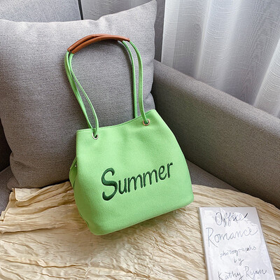 

Summer new casual bag female 2019 new Korean fashion letters canvas bag wild single shoulder slung bucket bag