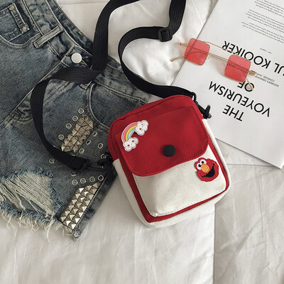 

2019 new simple&versatile fashion contrast color shoulder Messenger bag female casual cute cartoon sesame street canvas bag