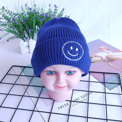 

Childrens wool hats Korea autumn&winter new warm smiling face knit cap head cap boys&girls baby hat candy