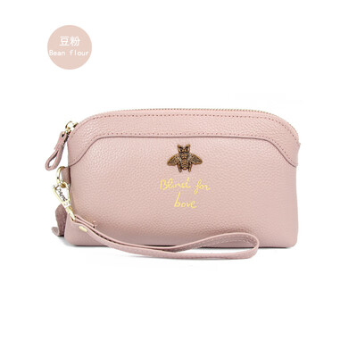 

The first layer of cowhide 2019 new ladies leather Europe&America bee bills position shell type clutch bag long wallet