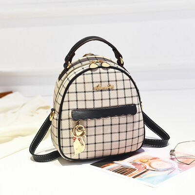 

The new trendy Korean version of the womens bag is a simple backpack with a single shoulder&a oblique satchel
