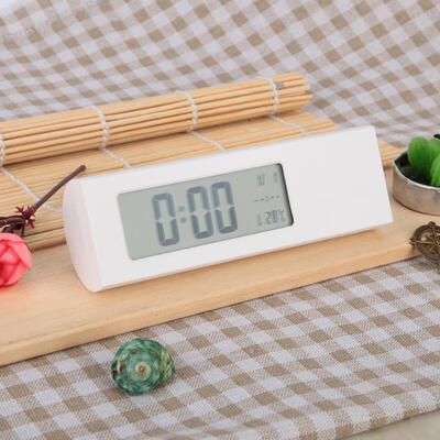 

Greensen Digital Alarm Clock LCD Display Bedside Clock with Day Date Temperature Backlight Function