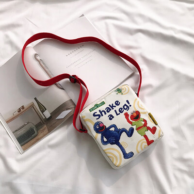 

Ins canvas bag female 2019 new wave Korean version of the wild personality graffiti shoulder bag cute Sesame Street Messenger bag