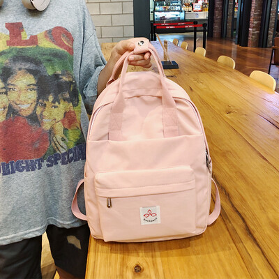 

Junior high school student bag female Korean version of high school students campus ins wind large capacity backpack vintage sense girl backpack