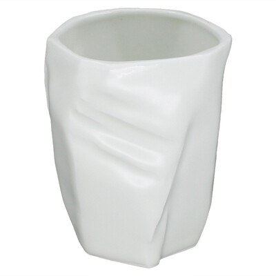 

A pottery ceramic cup 200ml creative rock white shaped design