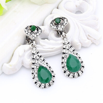 

Exhibition New Style Turkish Women Long Clip Earring Antique Silver Color Resin Symmetric Hollow Leaves Arab Earring Jewelry