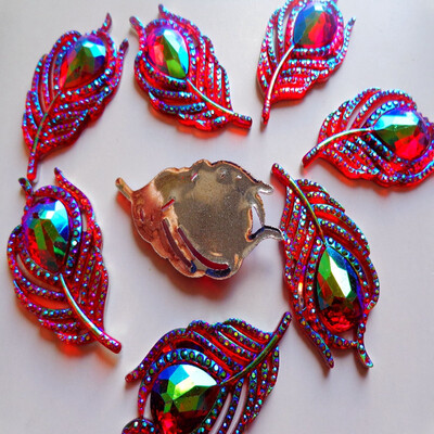 

20pcs new fashion style sew on crystal red rhinestones flatback leaf feather shape 2550mm handsewing gem stones