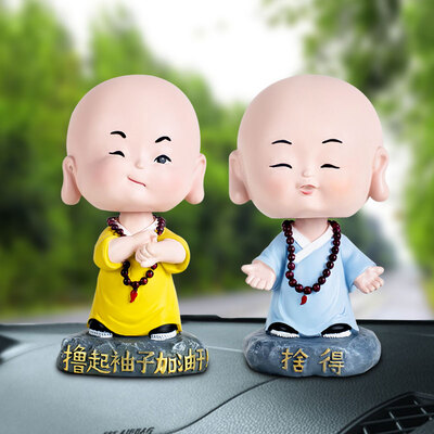 

Guangyin handmade car ornaments car accessories creative inspirational shaking head small monk two Buddha statues car supplies refueling