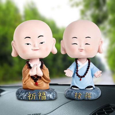 

Guangyin handmade car ornaments car accessories creative inspirational shaking head small monk two Buddha statues car supplies refueling